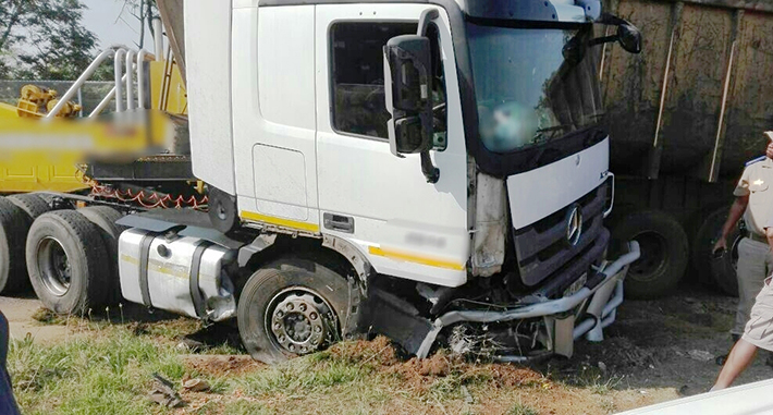 Critical woman airlifted after a large truck crashes into her small car